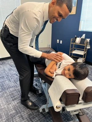 1787771667912-pediatric-chiropractic-spinal-adjustment-child-chiropractic-care-suite-60-001
